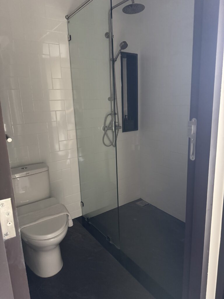 Bathroom and terrace bathtub in the Deluxe Room at Blue Monkey Hub & Hotel Krabi Town