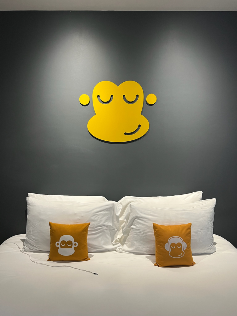 Room details and Blue Monkey mascot in the Deluxe Room

